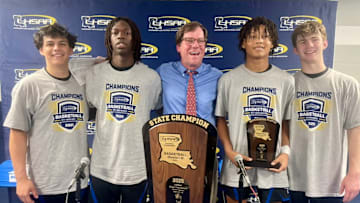 Curtis McAllister (second from right) was named Outstanding Player of the Division III select championship game.