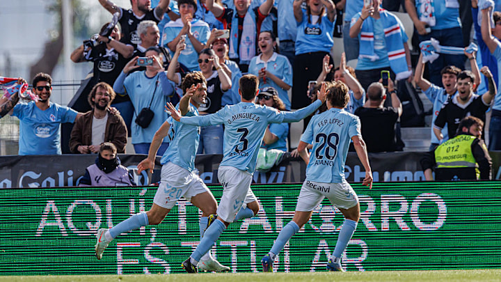 Players of Celta de Vigo seen celebrating after a goal from...