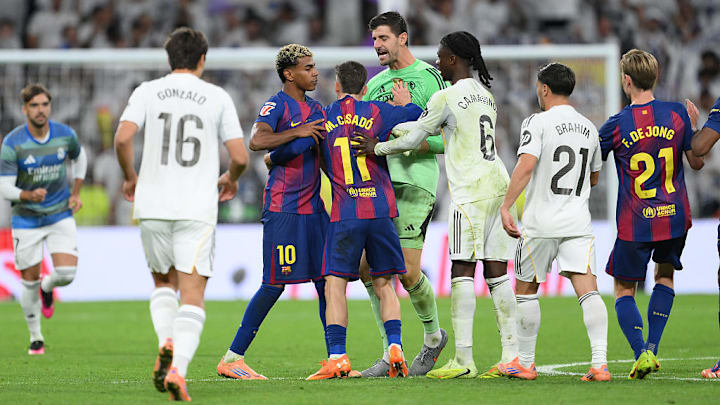 Thibaut Courtois (center) and Lamine Yamal came together after the final whistle. Thibaut Courtois (center) and Lamine Yamal came together after the final whistle.
