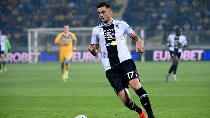 Lorenzo Lucca of Udinese Calcio in action during the Serie A...