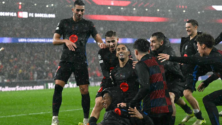 TOPSHOT-FBL-EUR-C1-BENFICA-BARCELONA