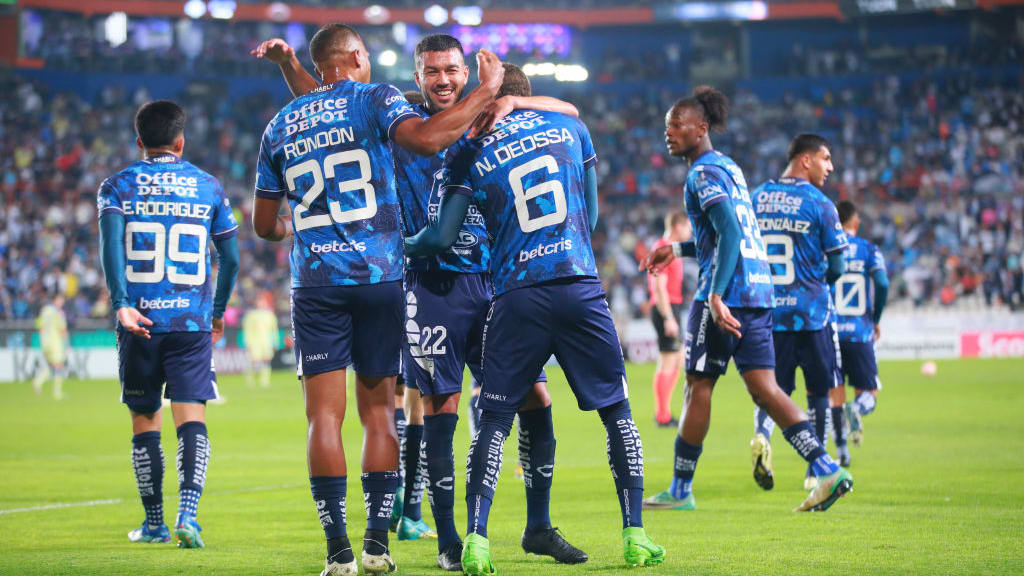 Pachuca's players celebrate scoring against America in the Concacaf Champions Cup