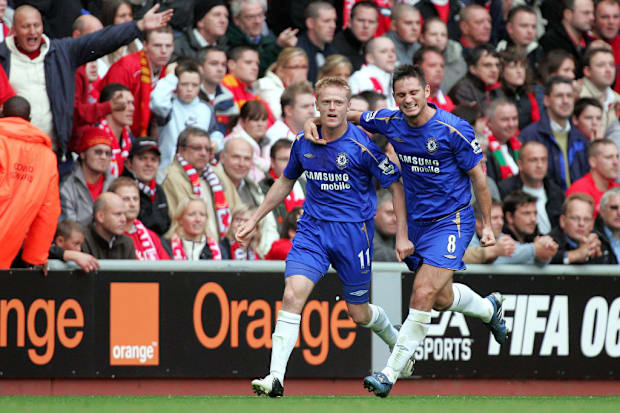 Chelsea players celebrate at Anfield
