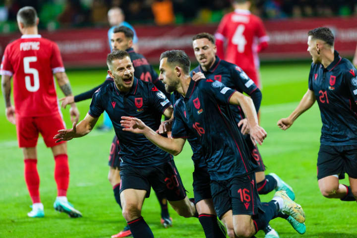 Sokol Cikalleshi and Yoder Ramadani of Albania celebrate...