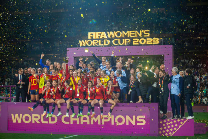 Spain Team and delegation celebrate with the trophy of the...