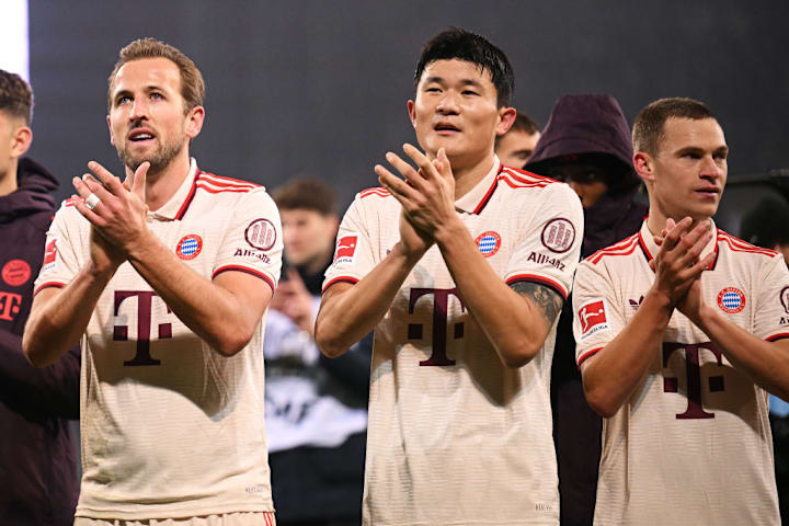 Harry Kane and Kim Min-jae celebrate Bayern's victory over St Paul's