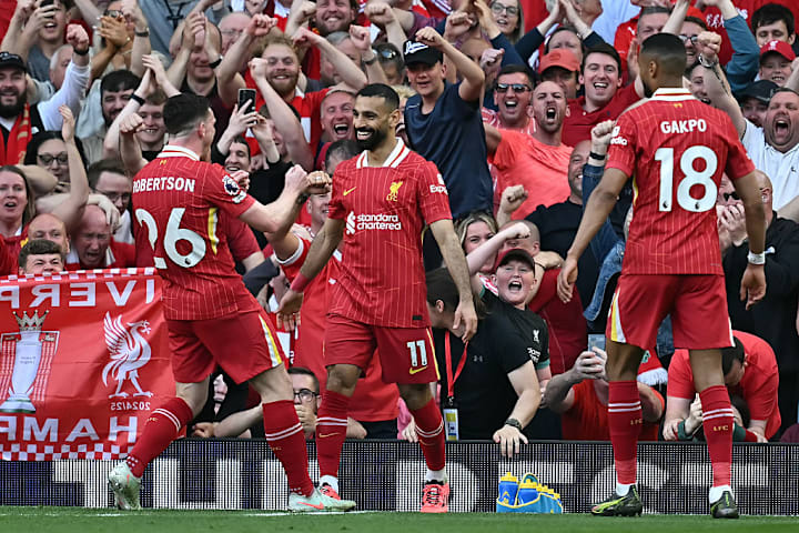 Mohamed Salah celebrates scoring Liverpool's fourth goal against Tottenha