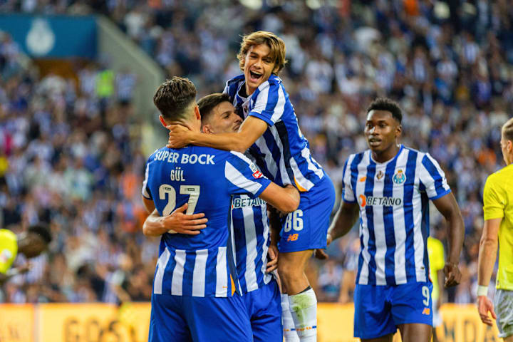 Deniz Gul of FC Porto celebrates a goal with his teammate...