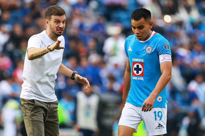Martín Anselmi, Carlos Rodriguez