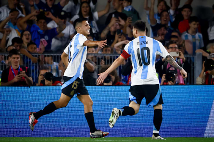 Thiago Almada (L) and Lionel Messi (R) of Argentina seen in...