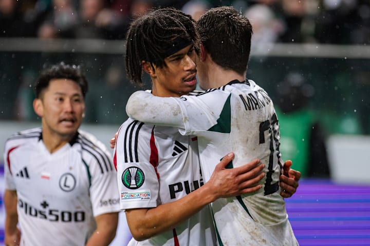 Maximillian Maxi Oyedele (L) and Marc Gual (R) of Legia...