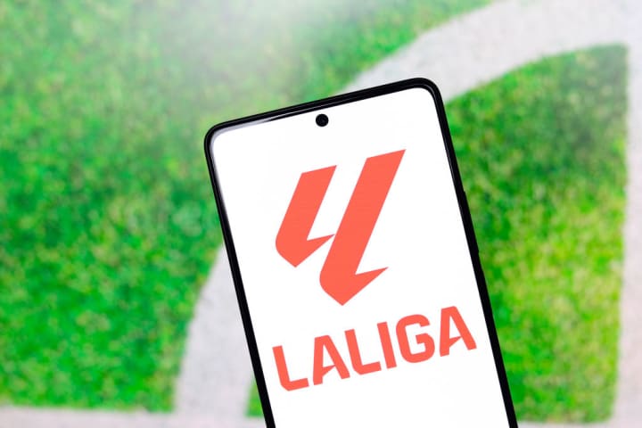 In this photo illustration, the La Liga logo is displayed on...