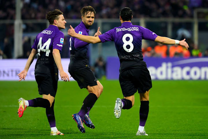 Rolando Mandragora of ACF Fiorentina (r) celebrates with...