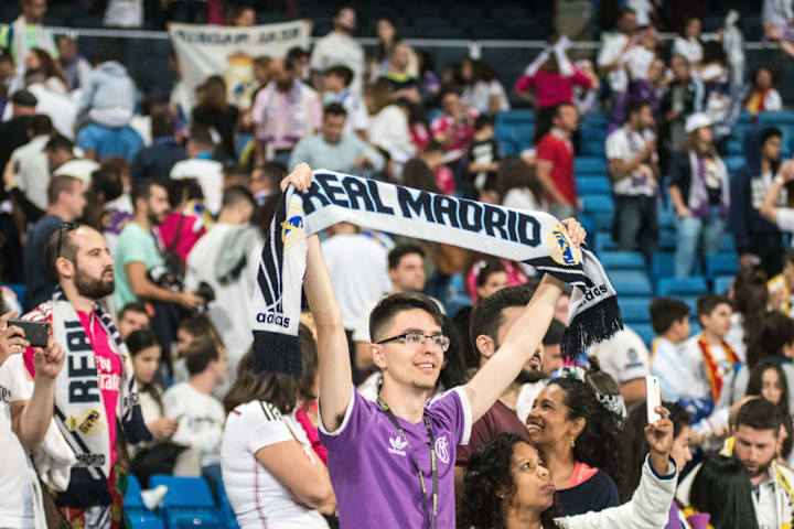 Real Madrid fan in Santiago Bernabeu stadium during the...