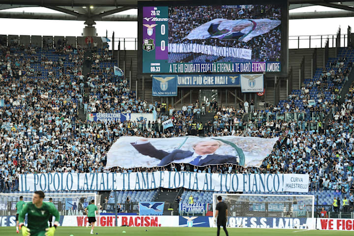 Lazio fans show a choreography for greeting the former SS...