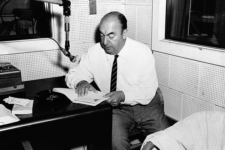 Pablo Neruda reading poetry in a recording studio