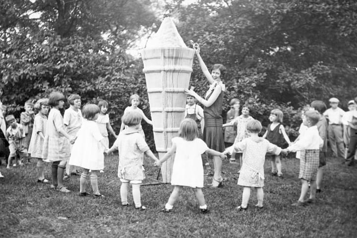 Children Around Giant Ice Cream Cone
