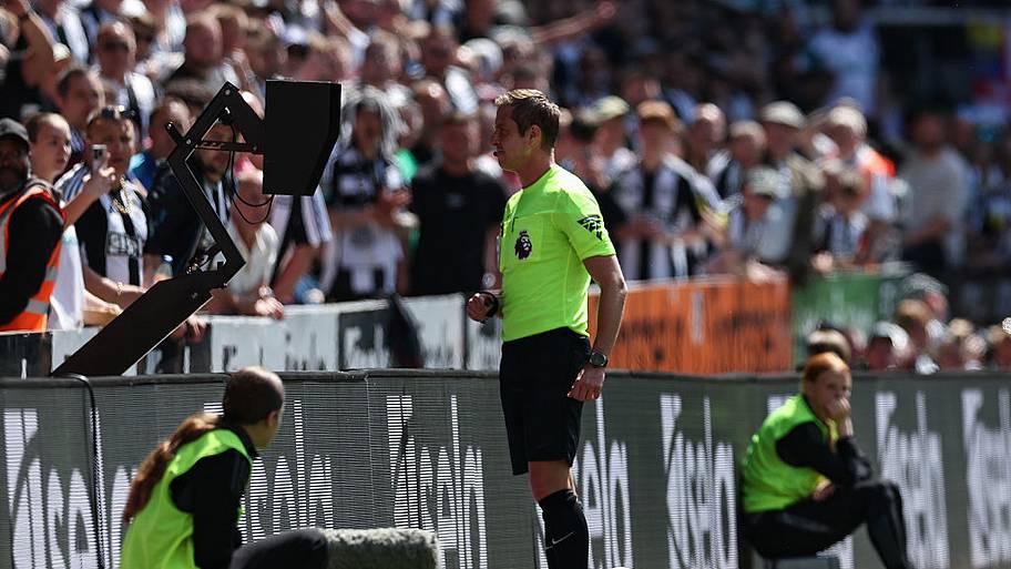 John Brooks looks at the VAR monitor during Newcastle’s Premier League clash with Chelsea.