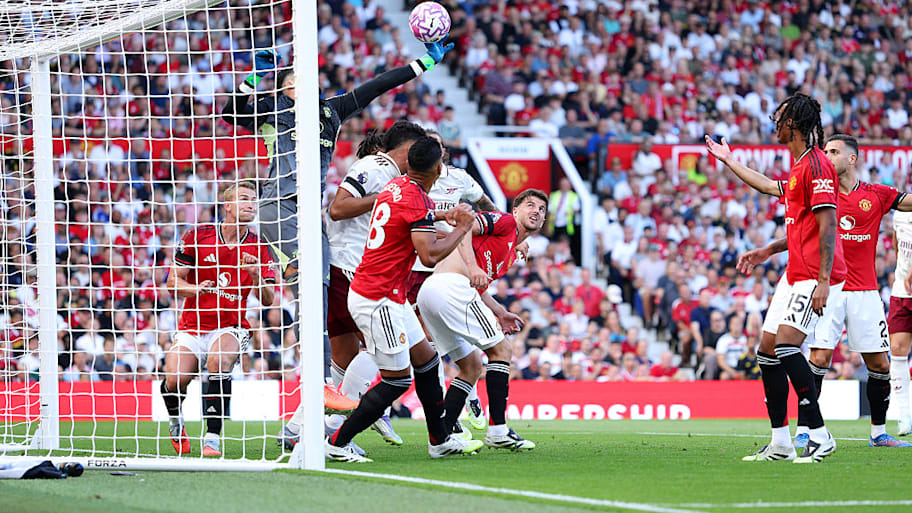 Altay Bayindir attempts to punch the ball during Man Utd’s clash with Arsenal.