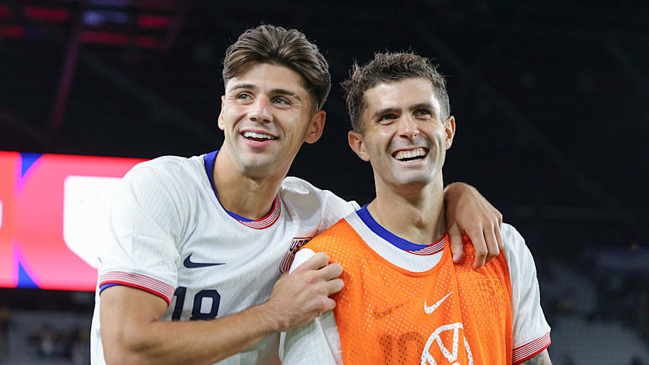 Max Arfsten (left) alongside Christian Pulisic.