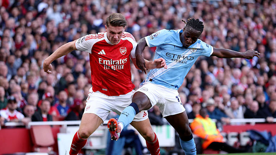 Viktor Gyokeres of Arsenal and Jeremy Doku of Manchester City