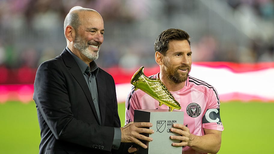 Lionel Messi poses with MLS Golden Boot trophy.