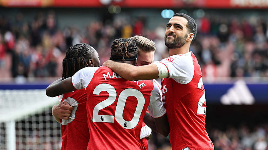 Arsenal players celebrate scoring against Nottingham Forest.