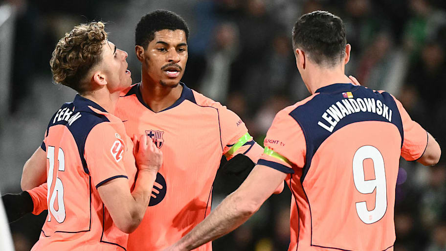 Barcelona player celebrating Rashford’s goal.