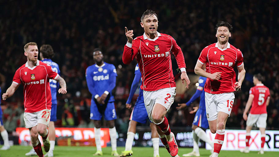 Wrexham players celebrating. 
