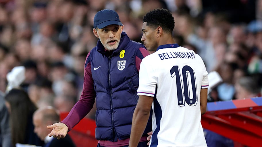 Thomas Tuchel instructs Jude Bellingham during a 2025 England match.