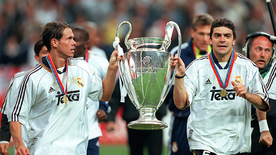 Fernando Redondo (lefts) holds up the Champions League trophy.