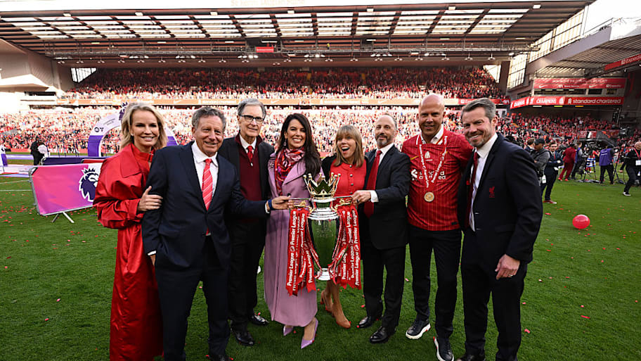 Liverpool owners, Arne Slot with Premier League trophy.