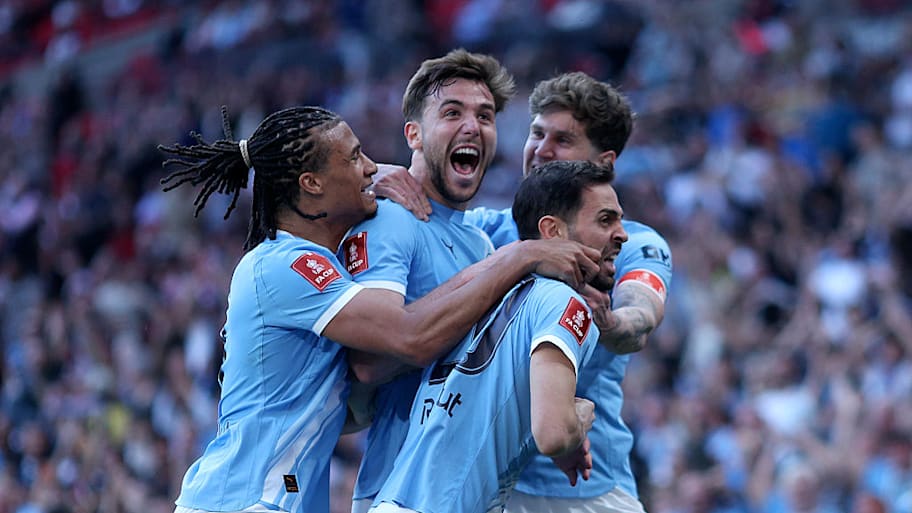 Man City players celebrate