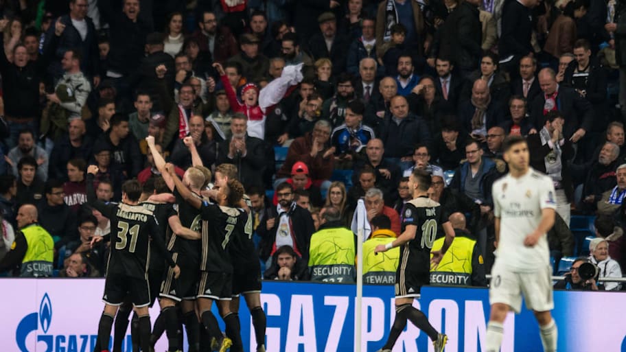 Ajax celebrate their win over Real Madrid.