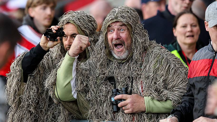Mocking Southampton fans in camouflage ghillie suits after their side was accused of spying on Middlesbrough training.