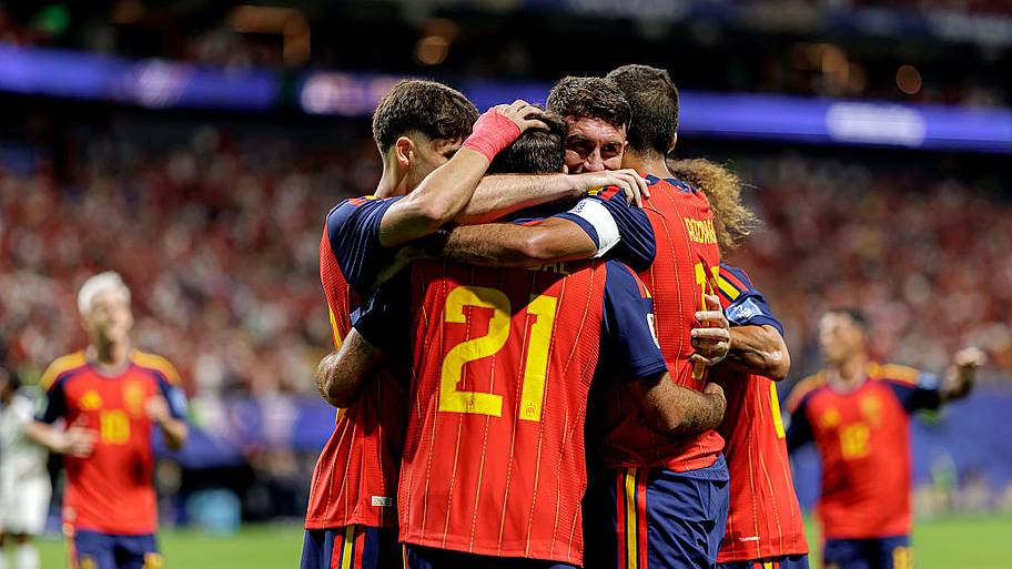 Spain players celebrate.
