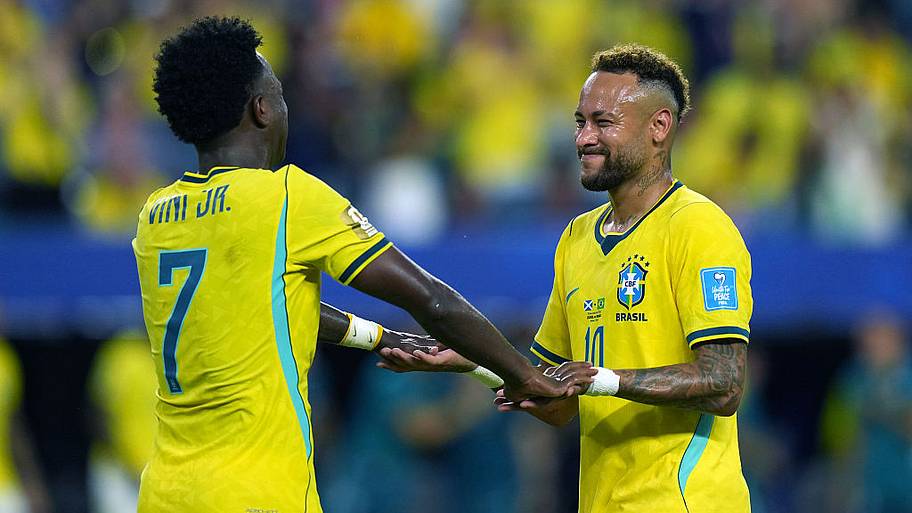 Vini Jr and Neymar embracing
