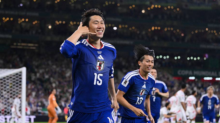 Daichi Kamada celebrating.