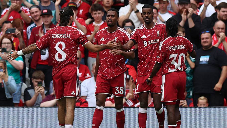 Liverpool players celebrate Alexander Isak goal