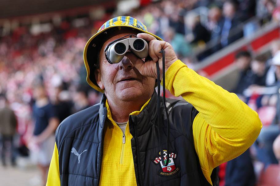 fan with binoculars.