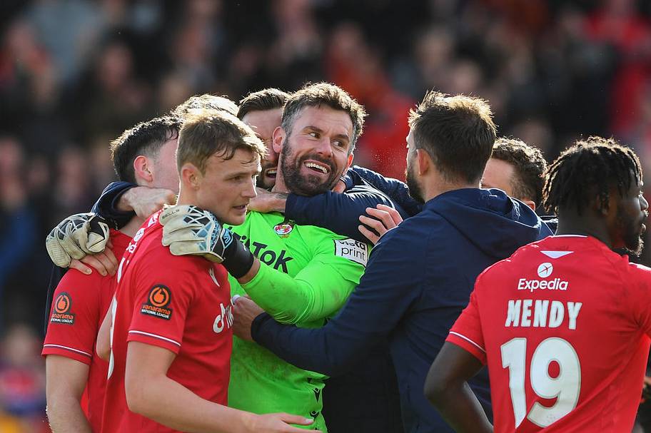 Ben Foster of Wrexham celebrates victory during the Vanarama National League match between Wrexham and Notts County. 