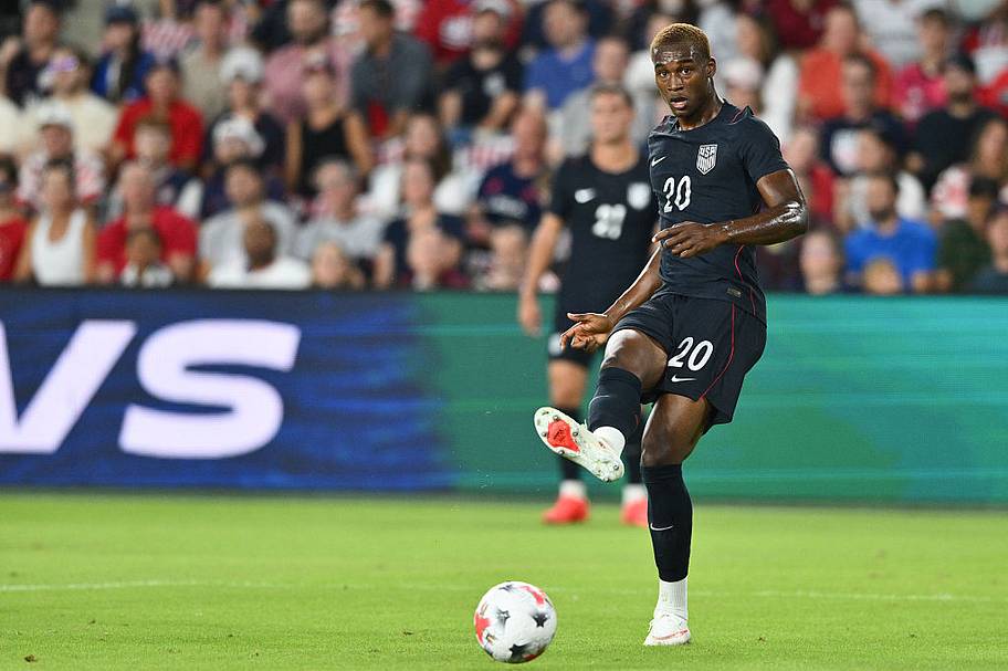 Pierre kicking the ball.