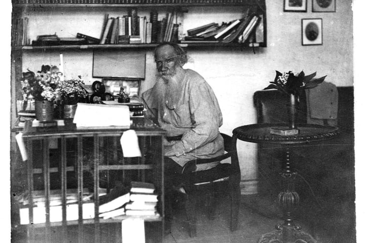 Writer Leo Tolstoy Sitting at Desk in His Study