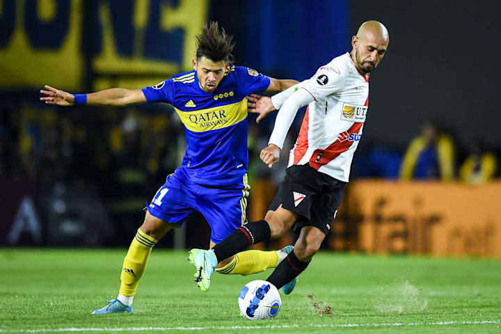 Oscar Romero, Marcos Riquelme