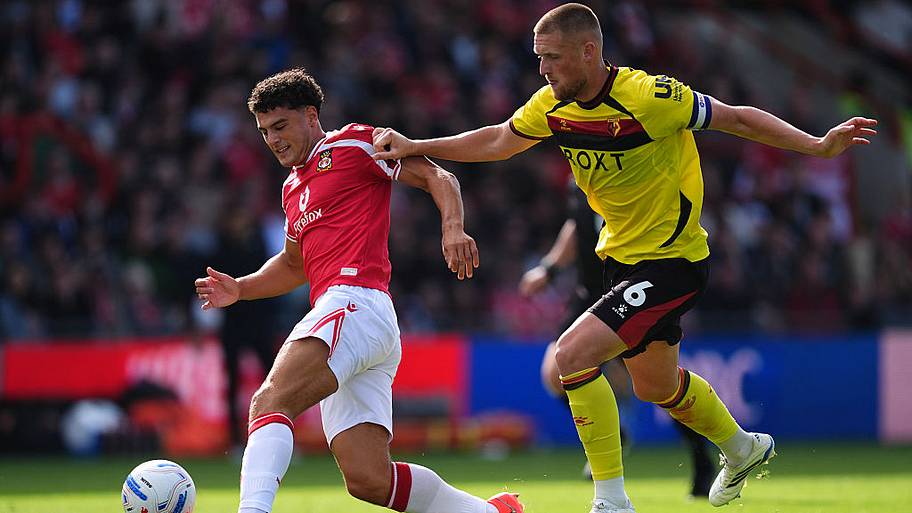 Bailey-Tye Cadamarteri (left) and Watford's Mattie Pollock battle for the ball.