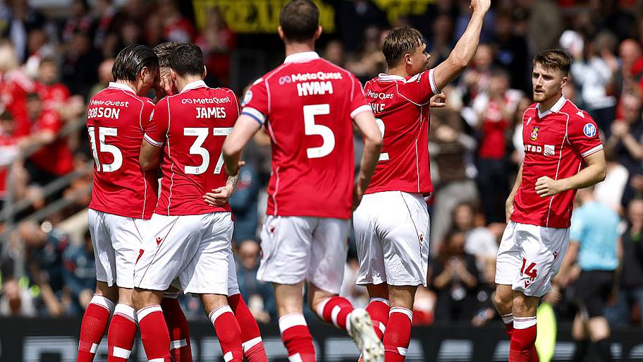 Josh Windass celebrates for Wrexham against Middlesbrough.