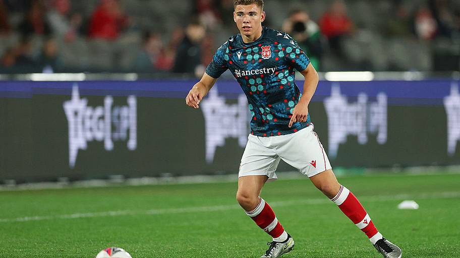 Alex Moore warms up prior to the match between Melbourne Victory and Wrexham AFC.