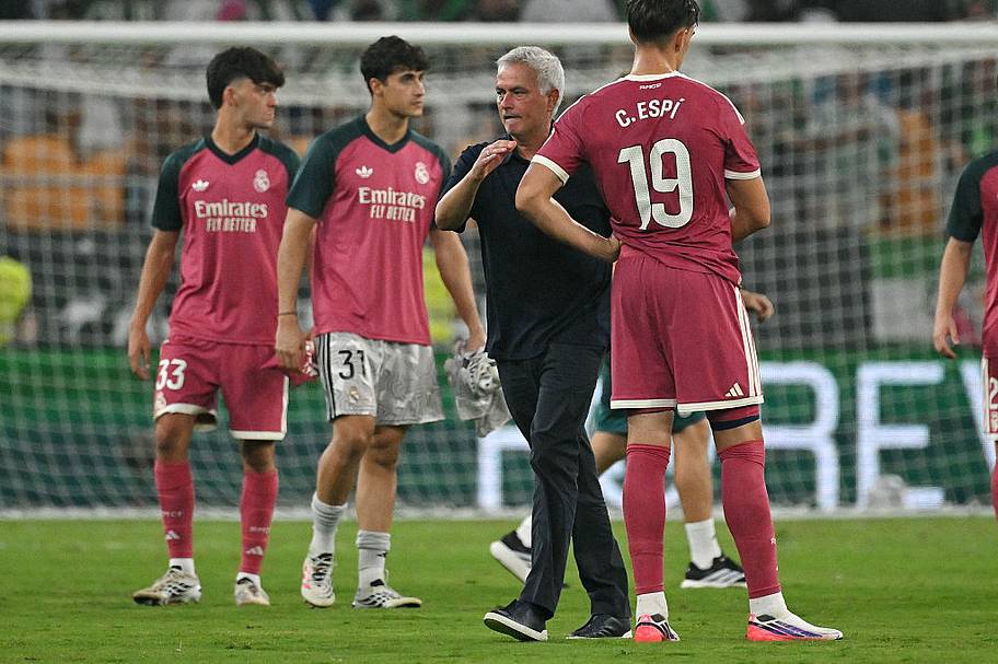 José Mourinho and Real Madrid players.