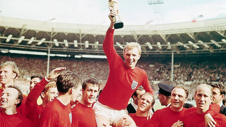 Bobby Moore holding World Cup trophy
