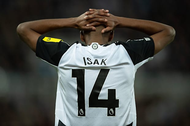 Alexander Isak with his hands on his head.